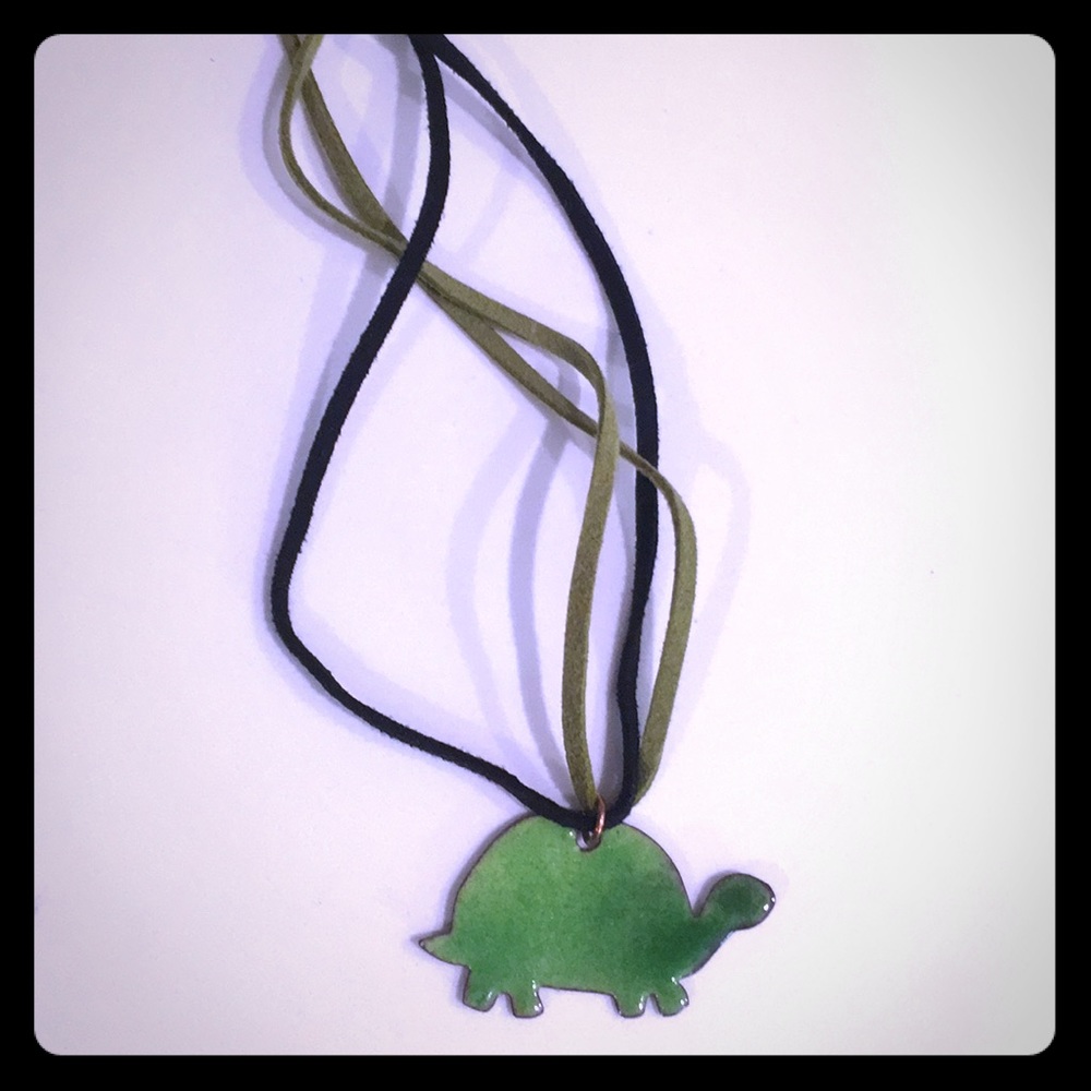 Turtle necklace on leather